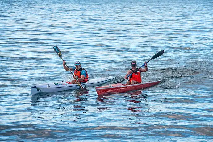 Two man doing Kayaking in lake